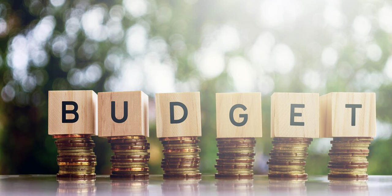 Image de cubes avec des lettres composant le mot «budget» sur des pièces de monnaie, issus du site ici.radio-canada.ca